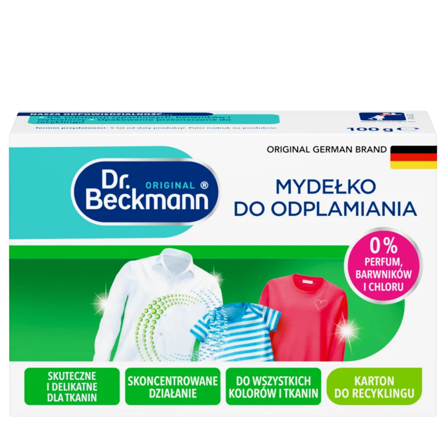 Mydełko do odplamiania – Białe prostokątne pudełko z turkusowymi i zielonymi sekcjami, wyświetlające trzy kolorowe ubrania i okrągłą odznaką.