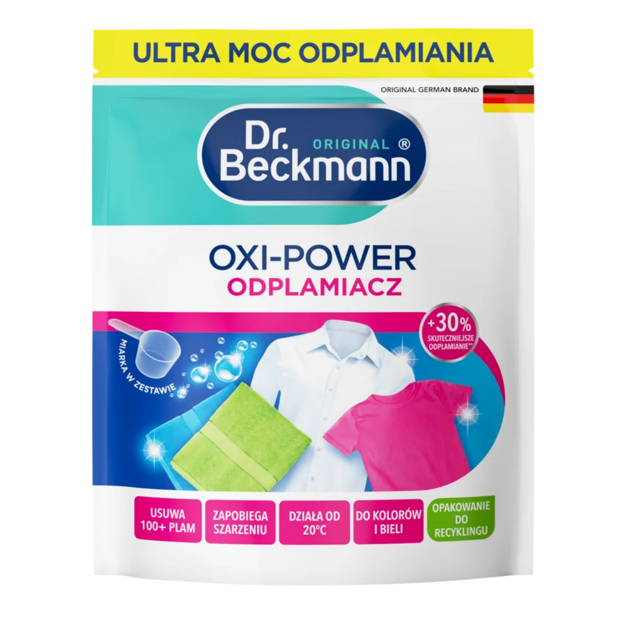 Oxi-Power odplamiacz – Biała saszetka z turkusowymi i niebieskimi elementami, wyświetlająca ściereczkę czyszczącą i kolorowe ubrania.